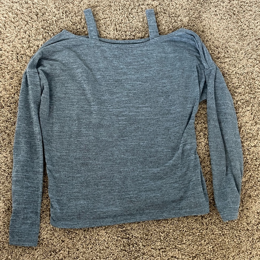 Blue sweater top with cut outs on the shoulders